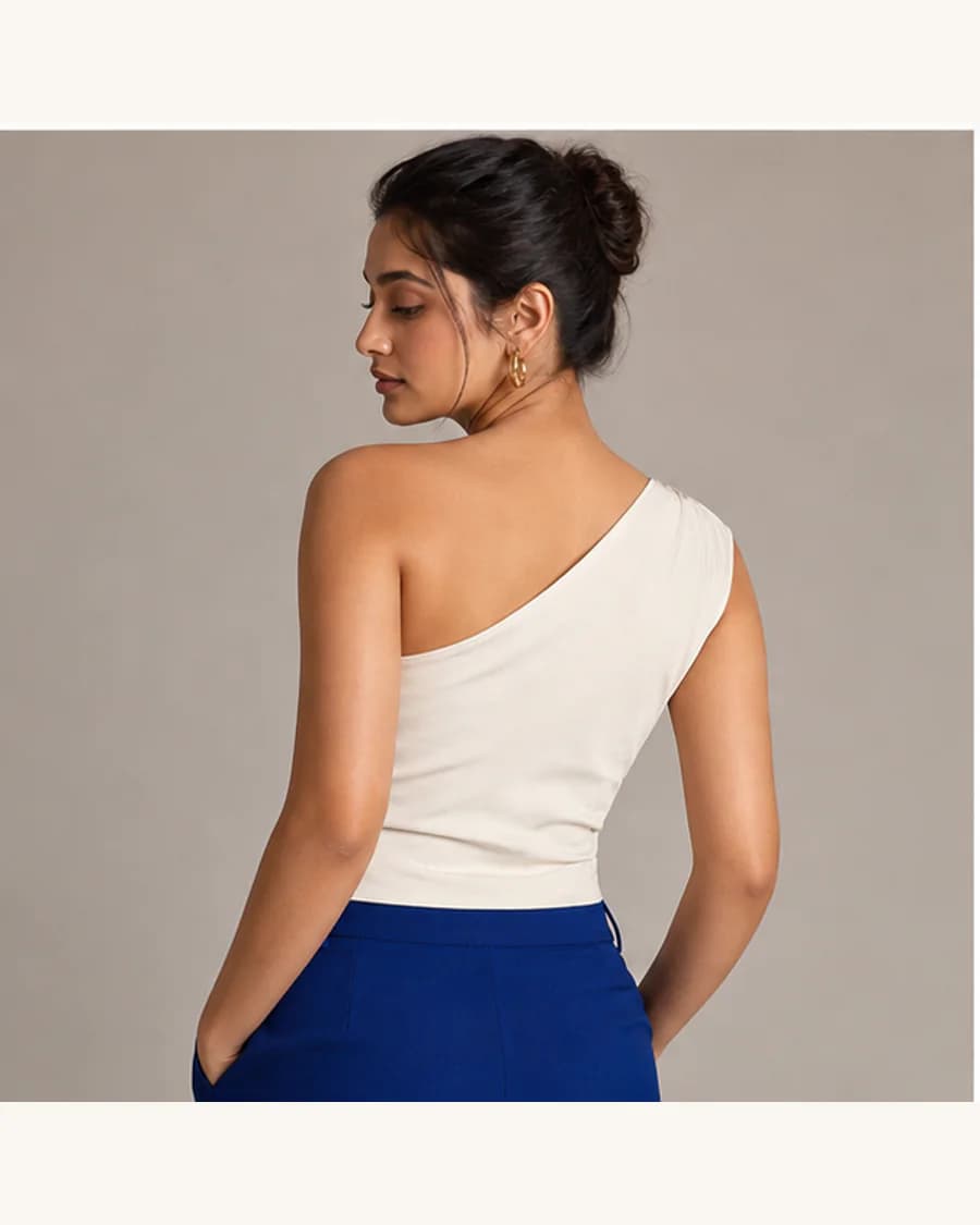 Ivory Halo One-Shoulder Top in White: three-quarter styling view