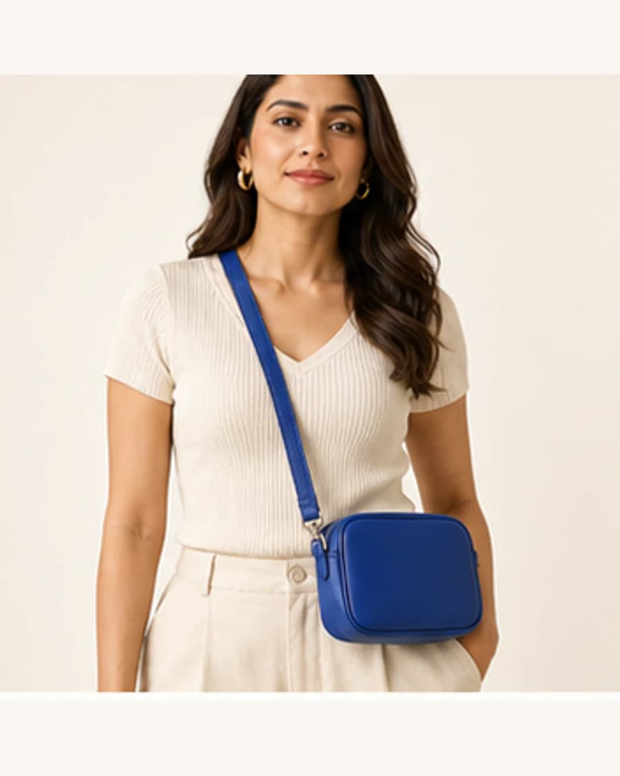 Mini Sling Bag: front styling view on an adult Indian model
