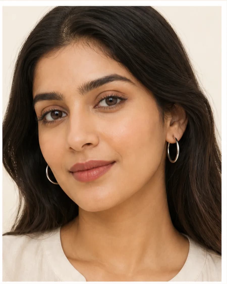Minimal Hoop Earrings: front styling view on an adult Indian model
