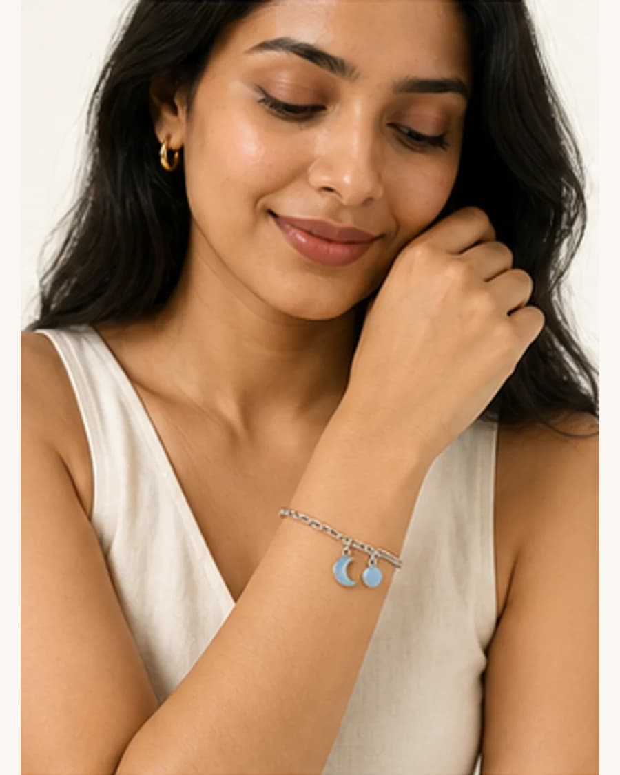Moonlit Charm Bracelet: front styling view on an adult Indian model