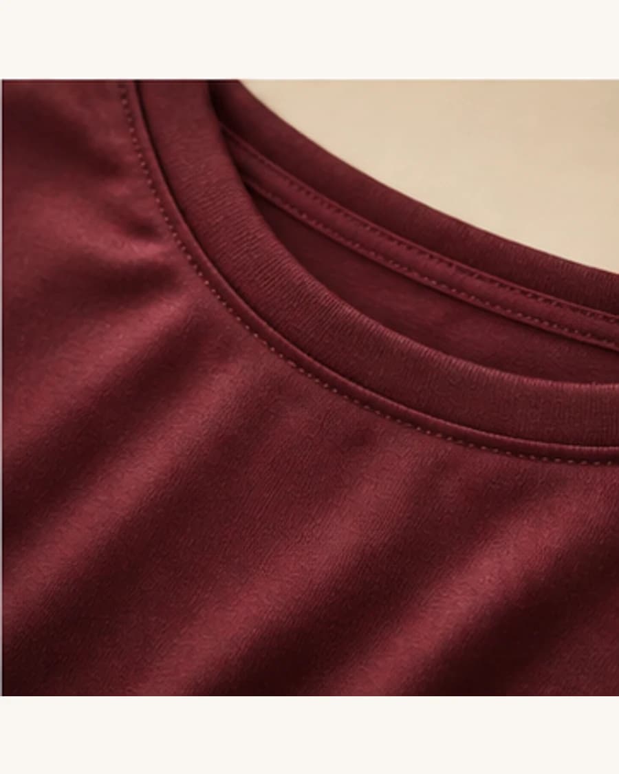 Muse Satin Crew Top: close-up detail view