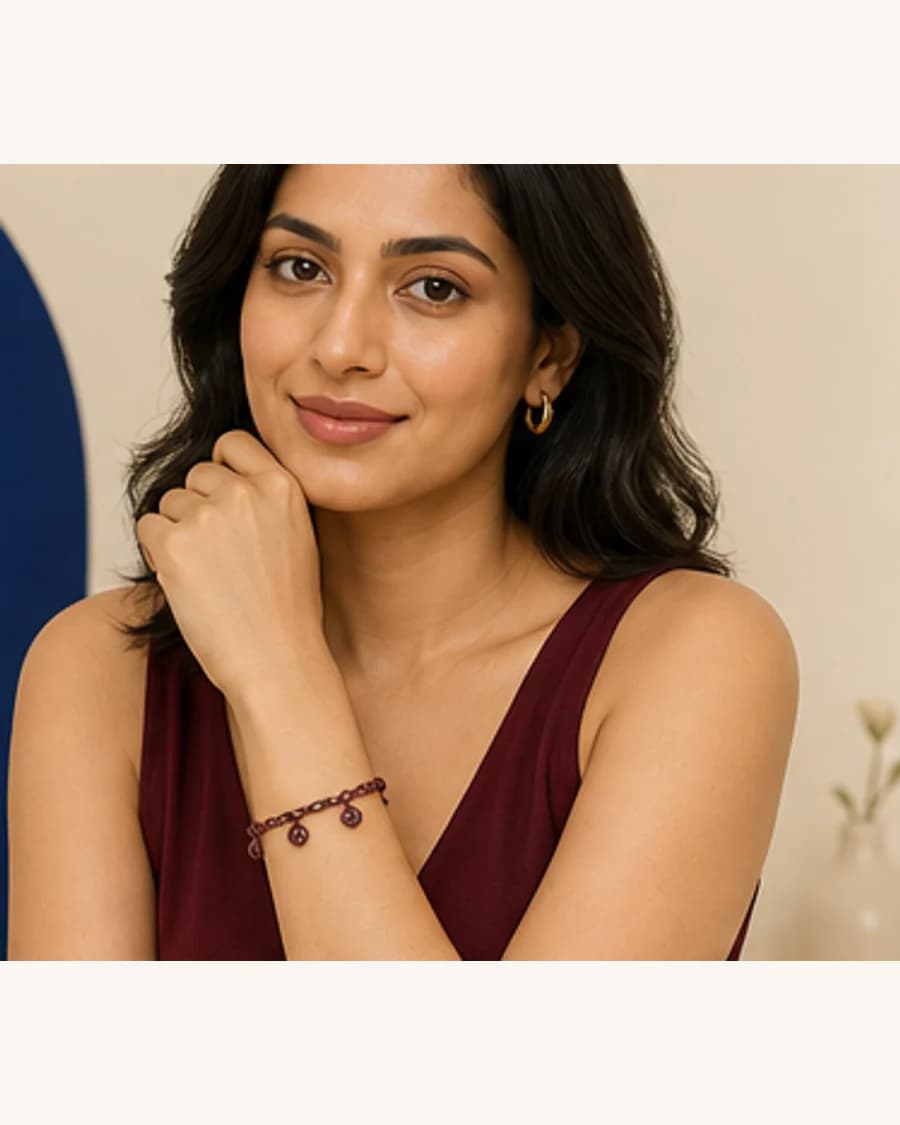 Orbit Charm Bracelet: front styling view on an adult Indian model
