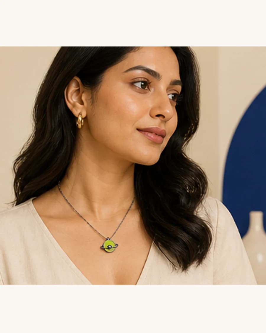 Orbit Pendant Necklace: three-quarter styling view