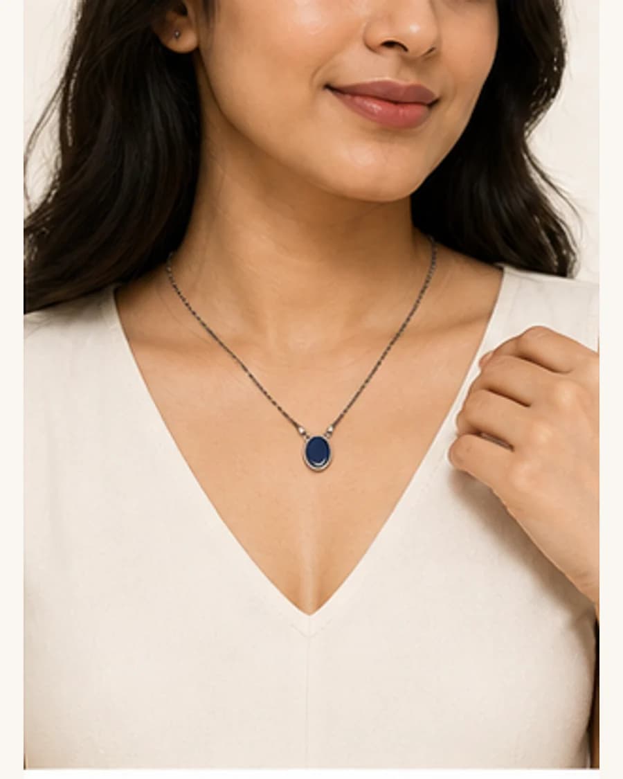 Riviera Pendant Necklace: front styling view on an adult Indian model