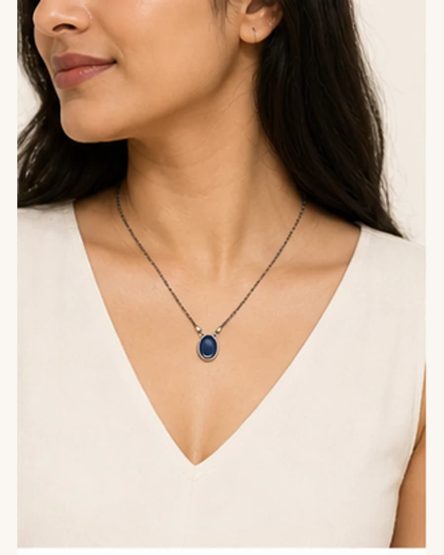 Riviera Pendant Necklace: three-quarter styling view